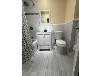 Well-maintained two-family brick home located in the highly - photo 11