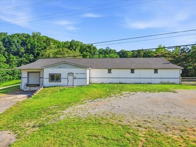 Excellent business opportunity with this cement block building - photo 1
