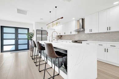Nestled in the heart of Palm Beach Gardens, this masterfully - photo 12