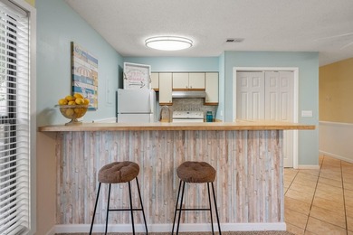 Turn-key comfort meets coastal convenience. Introducing this - photo 13