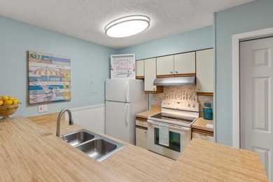 Turn-key comfort meets coastal convenience. Introducing this - photo 14