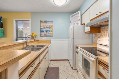 Turn-key comfort meets coastal convenience. Introducing this - photo 15