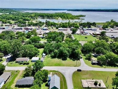 Level, buildable lot just a brief stroll from Lake Hudson - photo 6