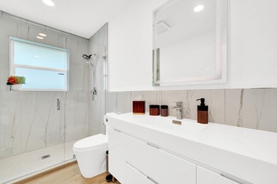 Nestled in the heart of Palm Beach Gardens, this masterfully - photo 19