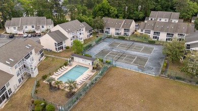 Turn-key comfort meets coastal convenience. Introducing this - photo 27