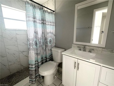Located at the end of a quiet cul-de-sac, this waterfront duplex - photo 25