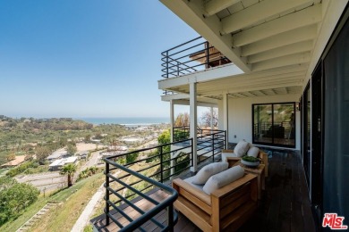 Nestled in the heart of Malibu, this architectural post-and-beam - photo 13
