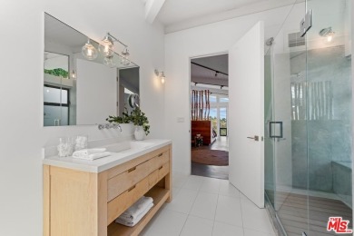 Nestled in the heart of Malibu, this architectural post-and-beam - photo 21