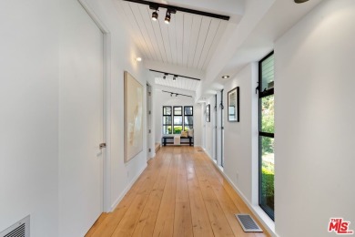 Nestled in the heart of Malibu, this architectural post-and-beam - photo 22