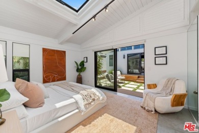 Nestled in the heart of Malibu, this architectural post-and-beam - photo 23
