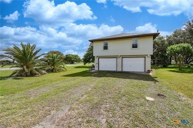 Bay breeze and shade trees await at 225 Swallow Dr. in gated - photo 3