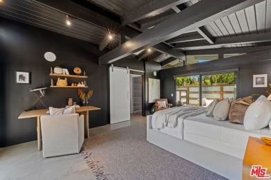 Nestled in the heart of Malibu, this architectural post-and-beam - photo 26