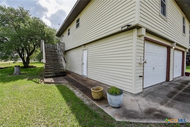 Bay breeze and shade trees await at 225 Swallow Dr. in gated - photo 7