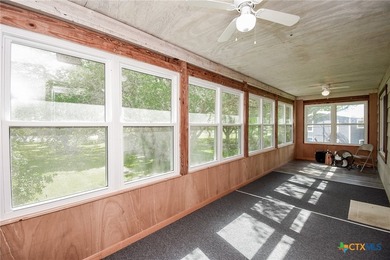 Bay breeze and shade trees await at 225 Swallow Dr. in gated - photo 9