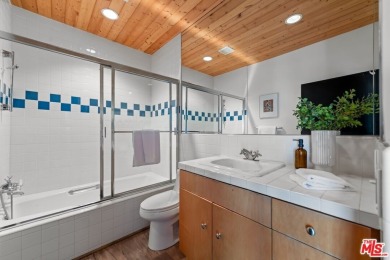 Nestled in the heart of Malibu, this architectural post-and-beam - photo 32