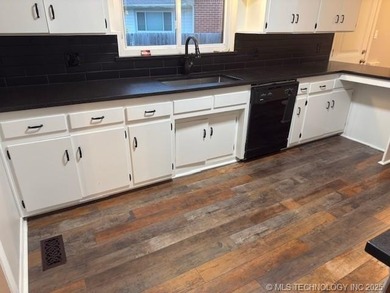 Charming Corner Lot Home in Prime Location! Welcome to your new