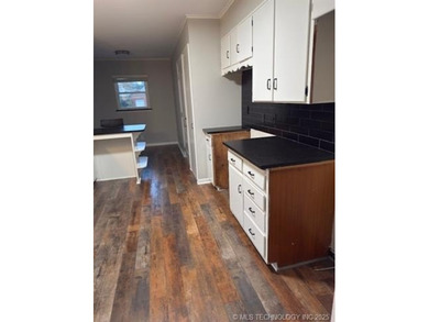 Charming Corner Lot Home in Prime Location! Welcome to your new