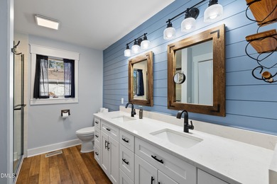 Enjoy lakefront living with peaceful water views and