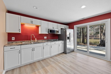 Enjoy lakefront living with peaceful water views and