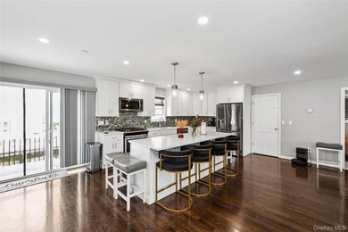 This NEW CONSTRUCTION waterfront Colonial offers modern luxury - photo 3