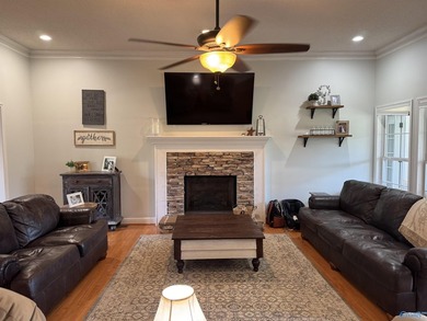 Welcome to this stunning 4 bedroom, 2.5 bathroom full brick home