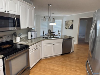 Welcome to this stunning 4 bedroom, 2.5 bathroom full brick home