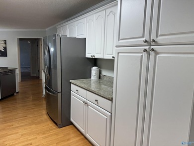 Welcome to this stunning 4 bedroom, 2.5 bathroom full brick home