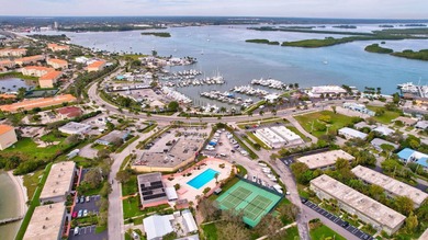 This beautifully updated 2 bedroom, 1 bath condo offers the - photo 31