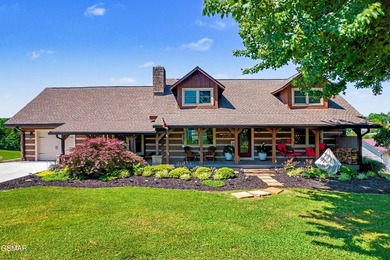 Enjoy the best of Douglas Lake living in this beautifully - photo 1