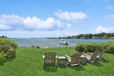 Tucked away in a secluded waterfront setting, this charming - photo 2