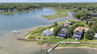 Tucked away in a secluded waterfront setting, this charming - photo 9