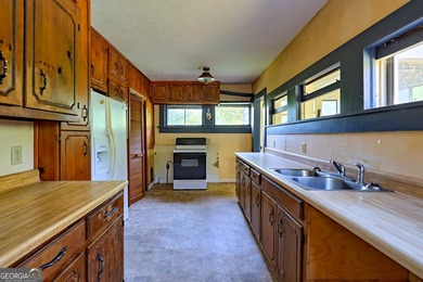 This exceptional 10.74-acre property in Lakemont, GA, presents a - photo 17