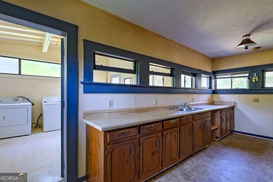 This exceptional 10.74-acre property in Lakemont, GA, presents a - photo 19