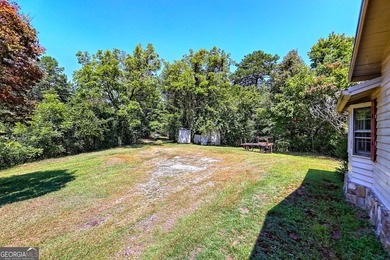 This exceptional 10.74-acre property in Lakemont, GA, presents a - photo 38