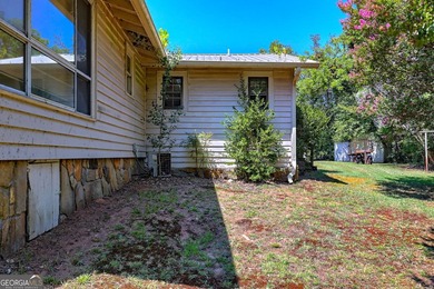 This exceptional 10.74-acre property in Lakemont, GA, presents a - photo 40
