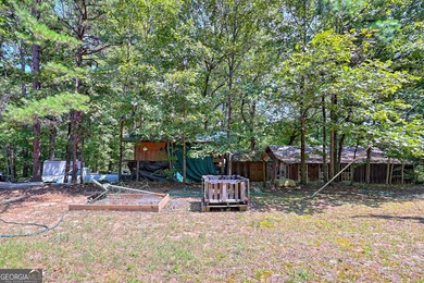 This exceptional 10.74-acre property in Lakemont, GA, presents a - photo 47