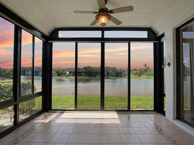 Beautifully updated 2BR/2BA first-floor condo with stunning lake - photo 1