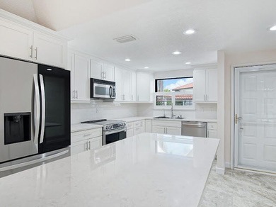Beautifully updated 2BR/2BA first-floor condo with stunning lake - photo 6