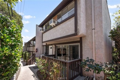 This RARE affordable corner townhome unit nestled in Miraleste - photo 1