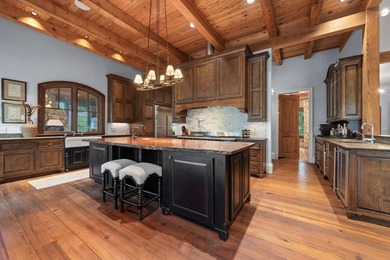 FULLY FURNISHED LAKE FRONT ESTATE LOCATED ON A COVE IN THE - photo 14