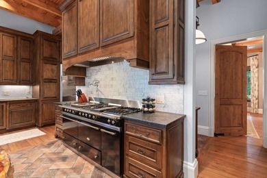 FULLY FURNISHED LAKE FRONT ESTATE LOCATED ON A COVE IN THE - photo 15