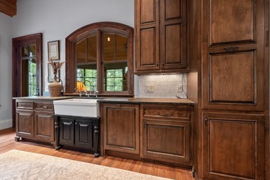FULLY FURNISHED LAKE FRONT ESTATE LOCATED ON A COVE IN THE - photo 16