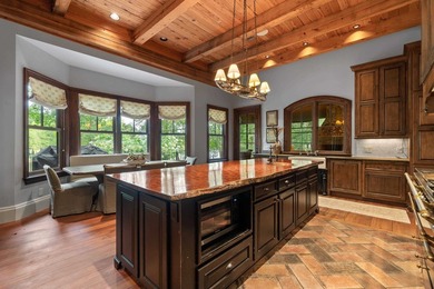 FULLY FURNISHED LAKE FRONT ESTATE LOCATED ON A COVE IN THE - photo 17