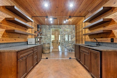 FULLY FURNISHED LAKE FRONT ESTATE LOCATED ON A COVE IN THE - photo 40