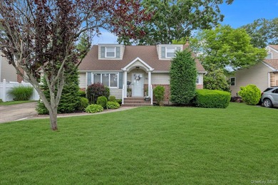 Welcome to this beautifully updated 4-bedroom, 2-bath Cape that - photo 1