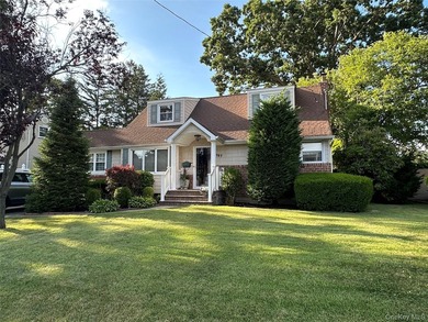 Welcome to this beautifully updated 4-bedroom, 2-bath Cape that - photo 2