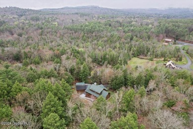 A classic Lincoln Log home set on a private 3+ acre lot, this - photo 6