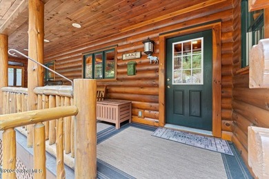 A classic Lincoln Log home set on a private 3+ acre lot, this - photo 7