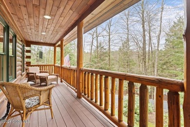 A classic Lincoln Log home set on a private 3+ acre lot, this - photo 9