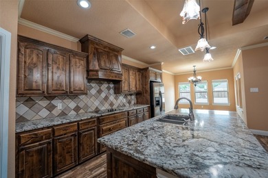 Welcome home to this charming retreat tucked into an established - photo 6